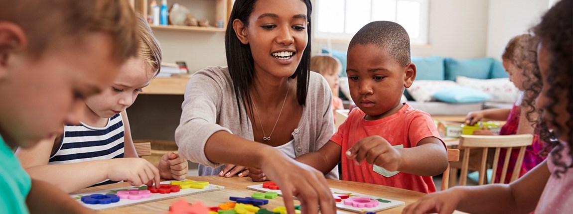 teacher-and-students-with-flower-blocks